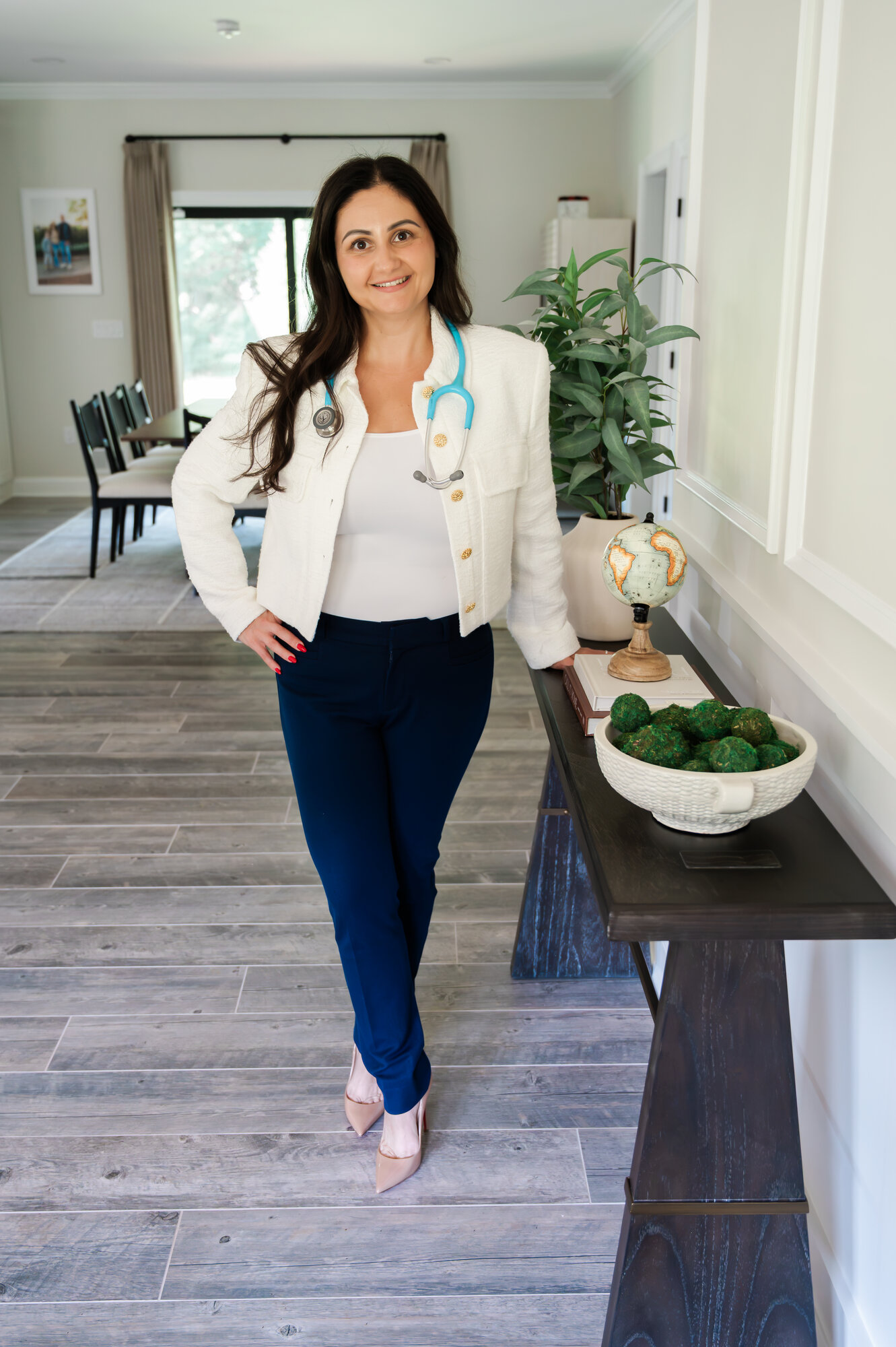 Loreta Labode standing with her stethoscope